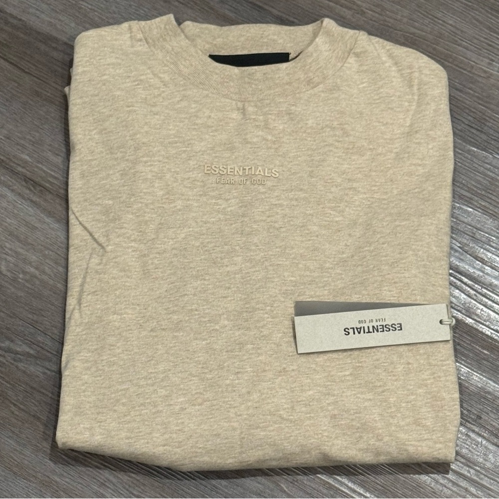 ESSENTIALS Fear of God Logo Long Sleeve in Gold Heather